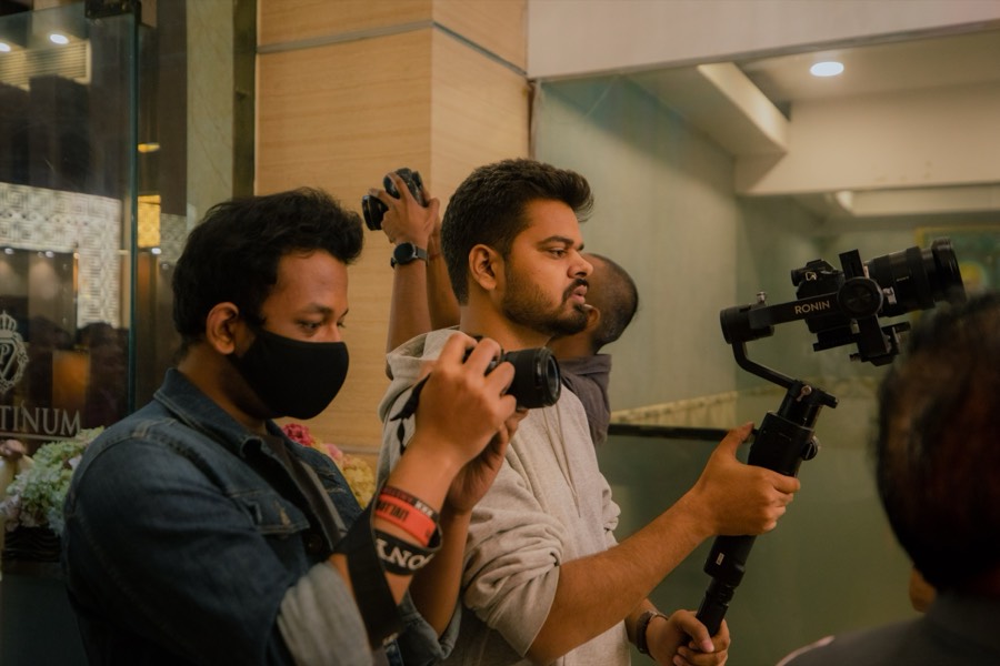 Saket framing a shot through the viewfinder