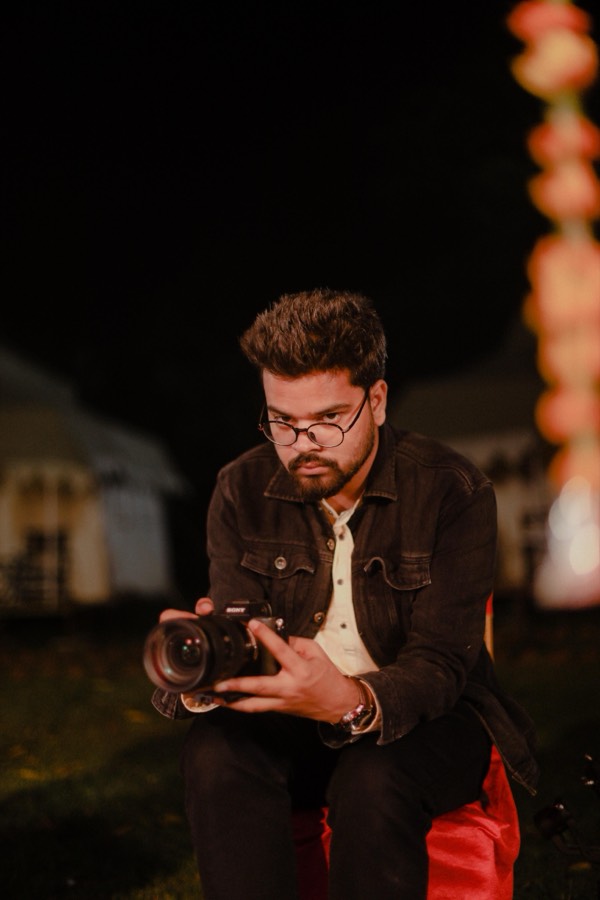 Saket reviewing footage at night