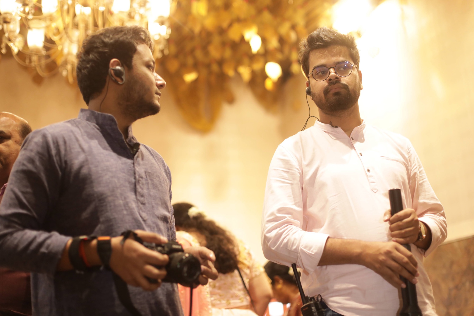Two Cup of Stories co-founders working together during a wedding